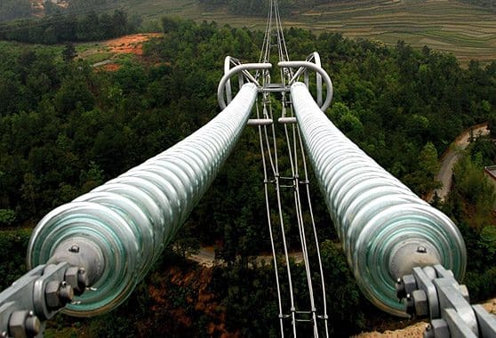 Glass insulator string for high voltage overhead transmission line