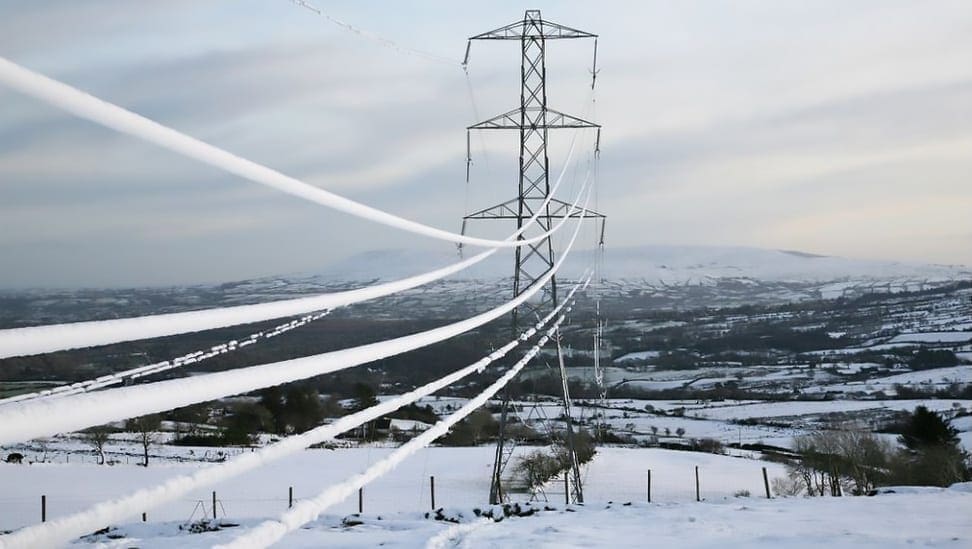 Transmission lines covered with snow