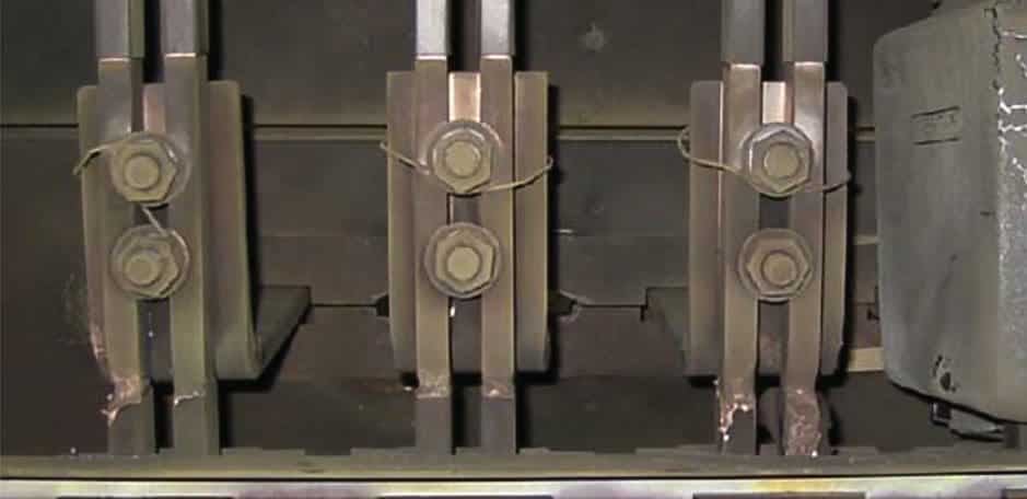 Partial melting of busbars after short time stationary arcing at the insulation barriers