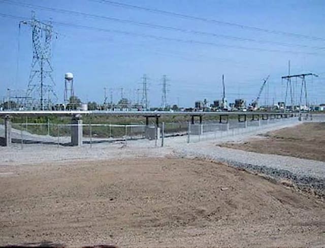 Single-phase insulated bus duct above ground installation at concrete blocks in a flooding area