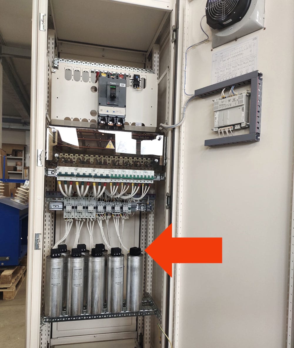 Terminals of discharge resistors on top of capacitor banks