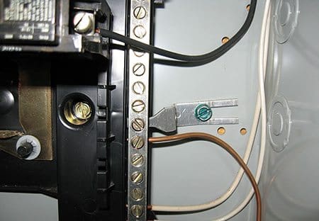 Service equipment enclosures are connected to the neutral by a main bonding jumper