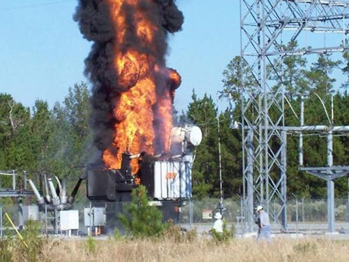 Flames shoot high out of a Georgia Power substation transformer